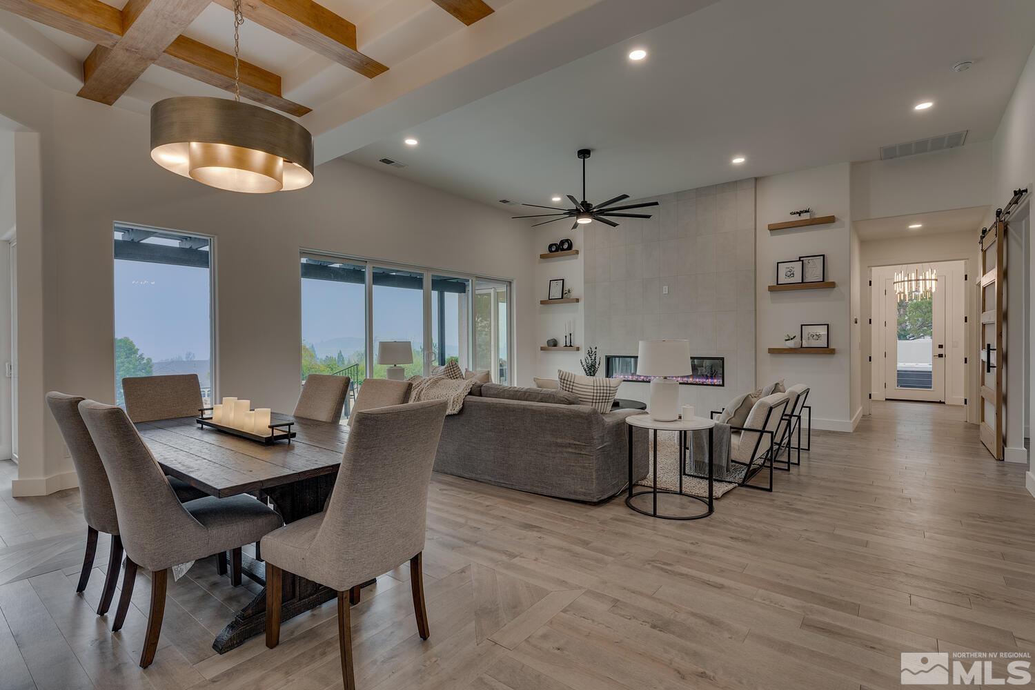 6109 Mesa Road Reno, NV 89511 - Photo 5 of 40 a view of a dining room with furniture and wooden floor