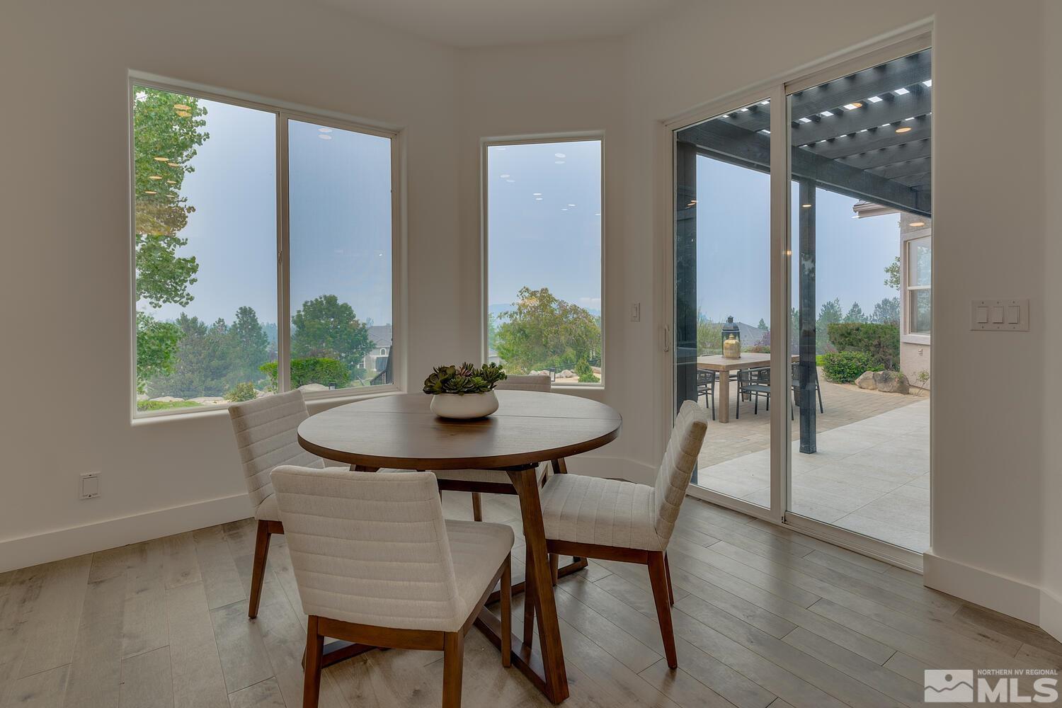 6109 Mesa Road Reno, NV 89511 - Photo 10 of 40 a view of a dining room with furniture and window