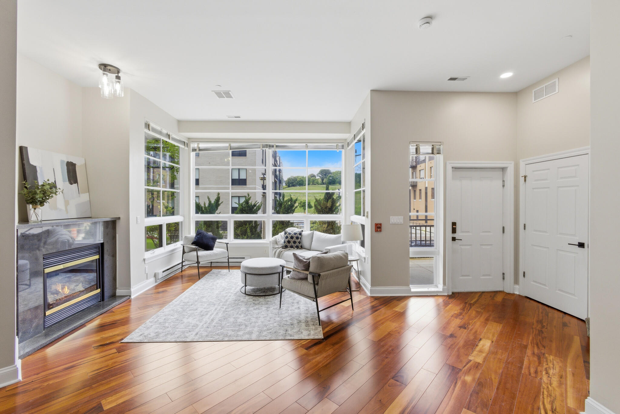 1888 North Water Street, Unit 101 Milwaukee, WI 53202 - Photo 5 of 26 11ft Ceilings with floor to ceiling windows!