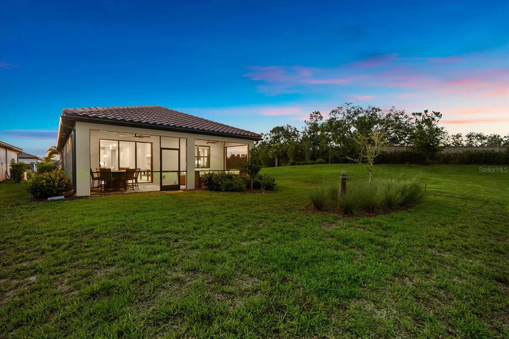 6791 Alstead Circle Lakewood Ranch, FL 34202 - Photo 11 of 25 a view of a house with a yard