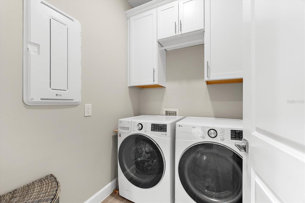 6791 Alstead Circle Lakewood Ranch, FL 34202 - Photo 9 of 25 a utility room with dryer and washer