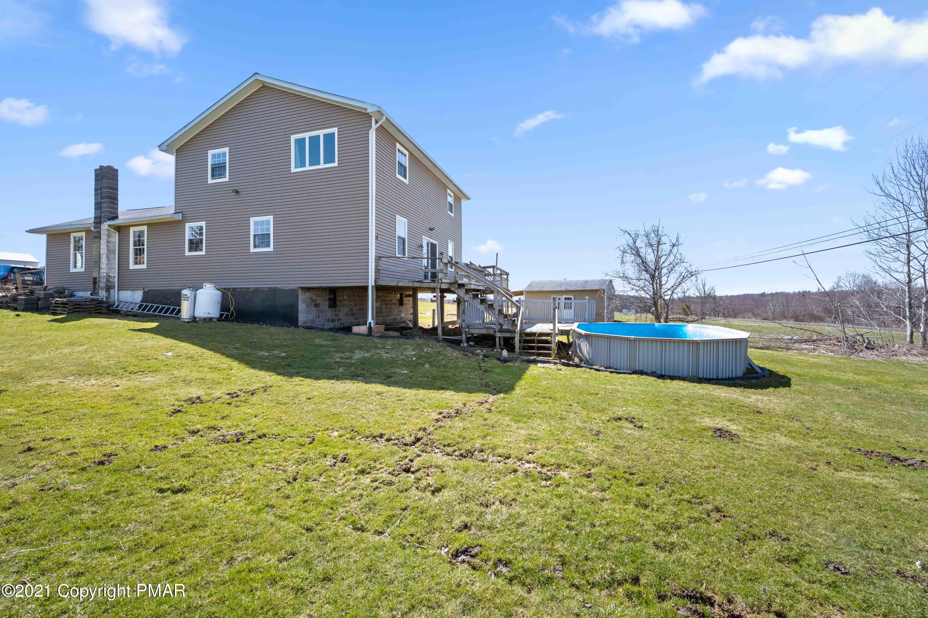 1571 State Rte 2016 Nicholson, PA 18446 - Photo 1 of 28 a view of a house with a yard