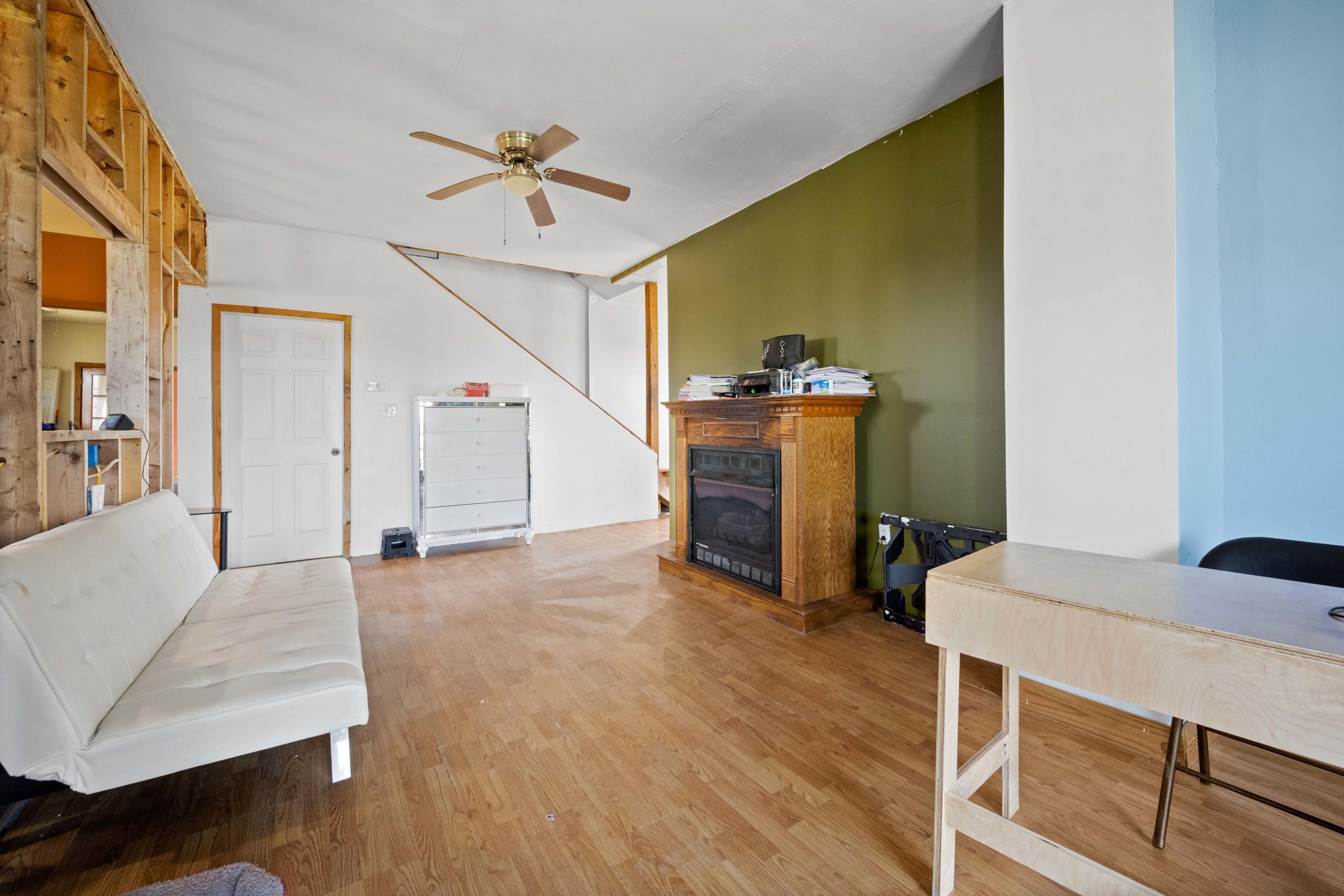 1571 State Rte 2016 Nicholson, PA 18446 - Photo 13 of 28 a view of livingroom with furniture and wooden floor
