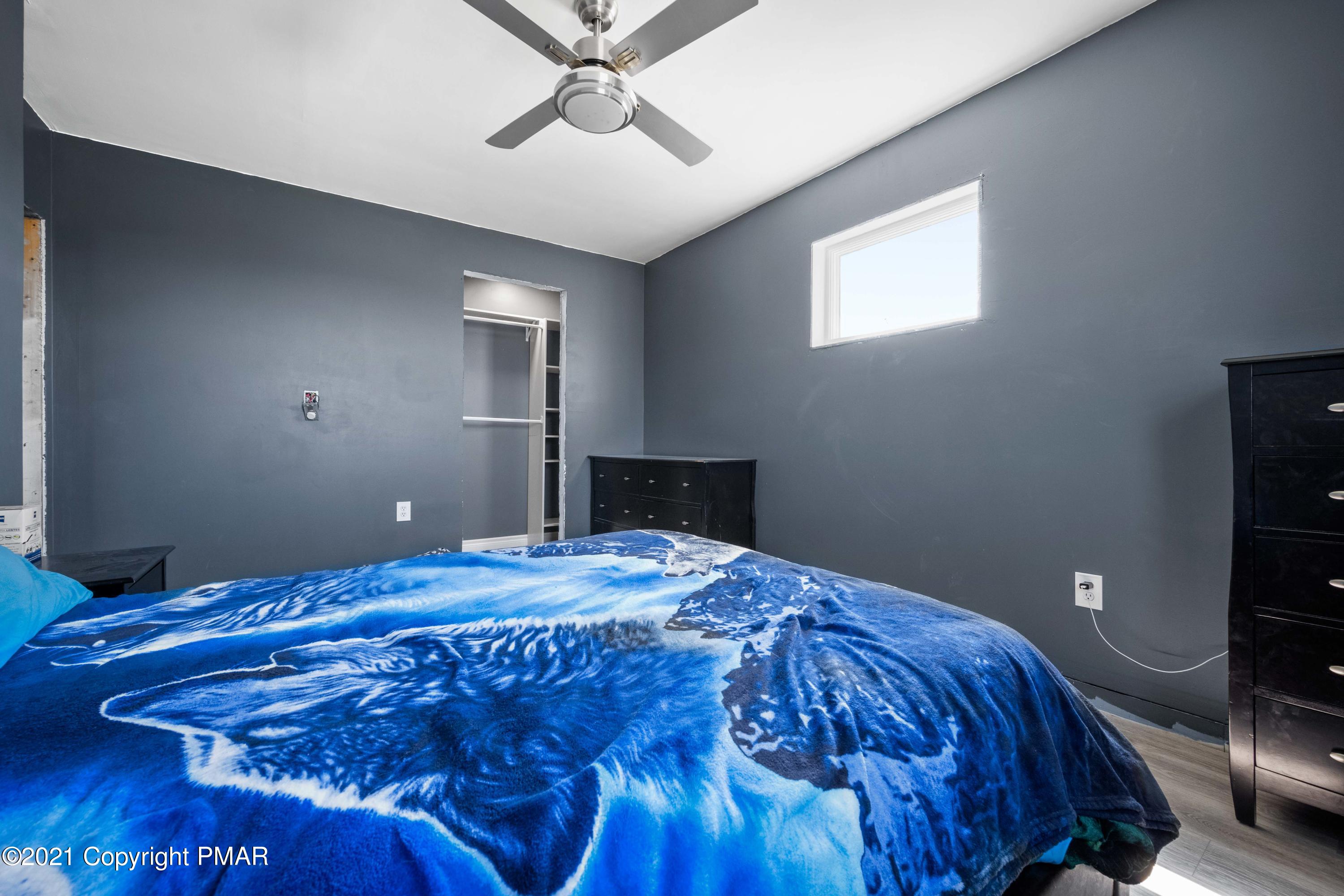 1571 State Rte 2016 Nicholson, PA 18446 - Photo 17 of 28 a bedroom with a bed and a window
