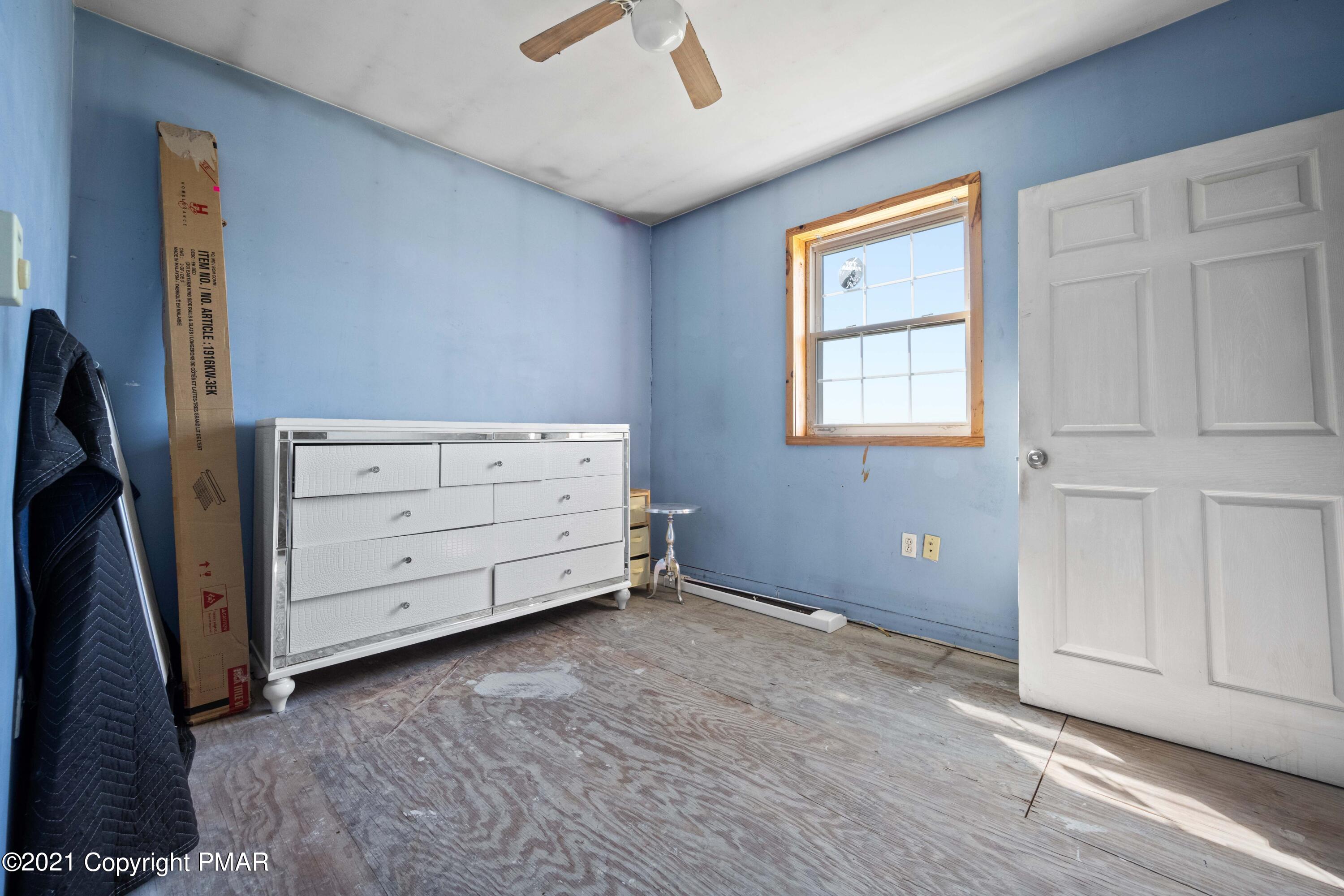1571 State Rte 2016 Nicholson, PA 18446 - Photo 19 of 28 an empty room with windows