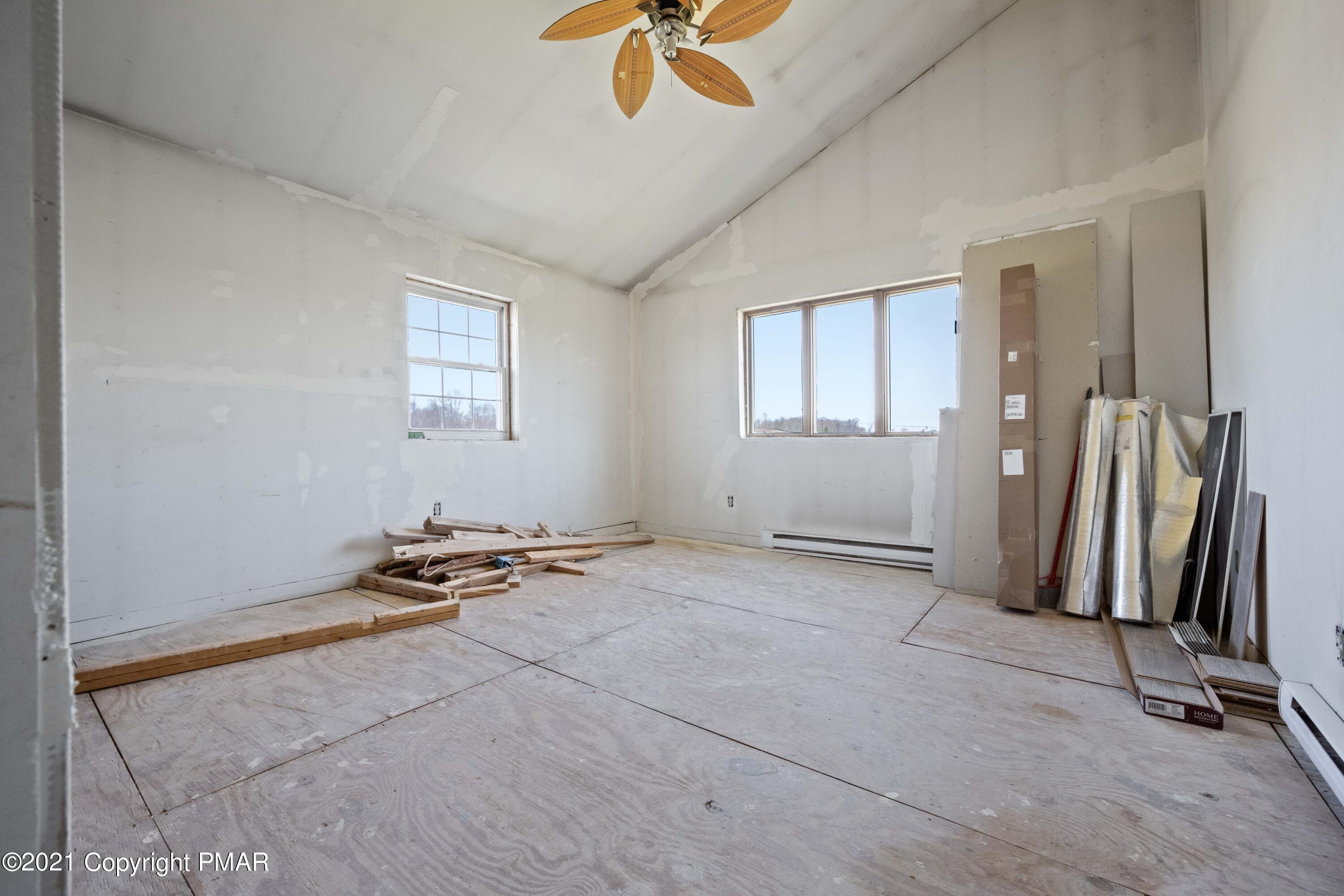1571 State Rte 2016 Nicholson, PA 18446 - Photo 20 of 28 a view of a room with gym equipment and a window