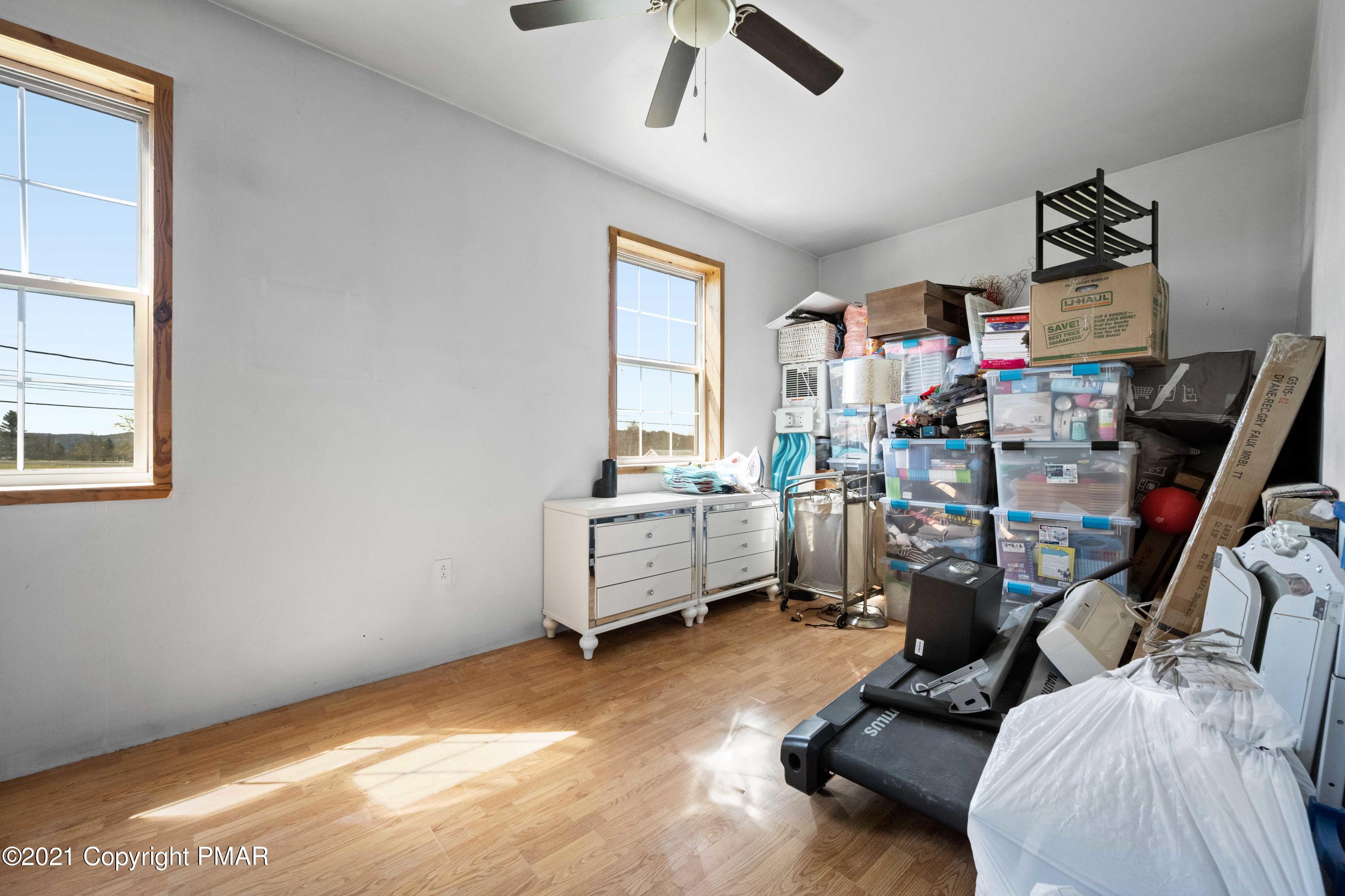 1571 State Rte 2016 Nicholson, PA 18446 - Photo 24 of 28 a room with furniture and a window