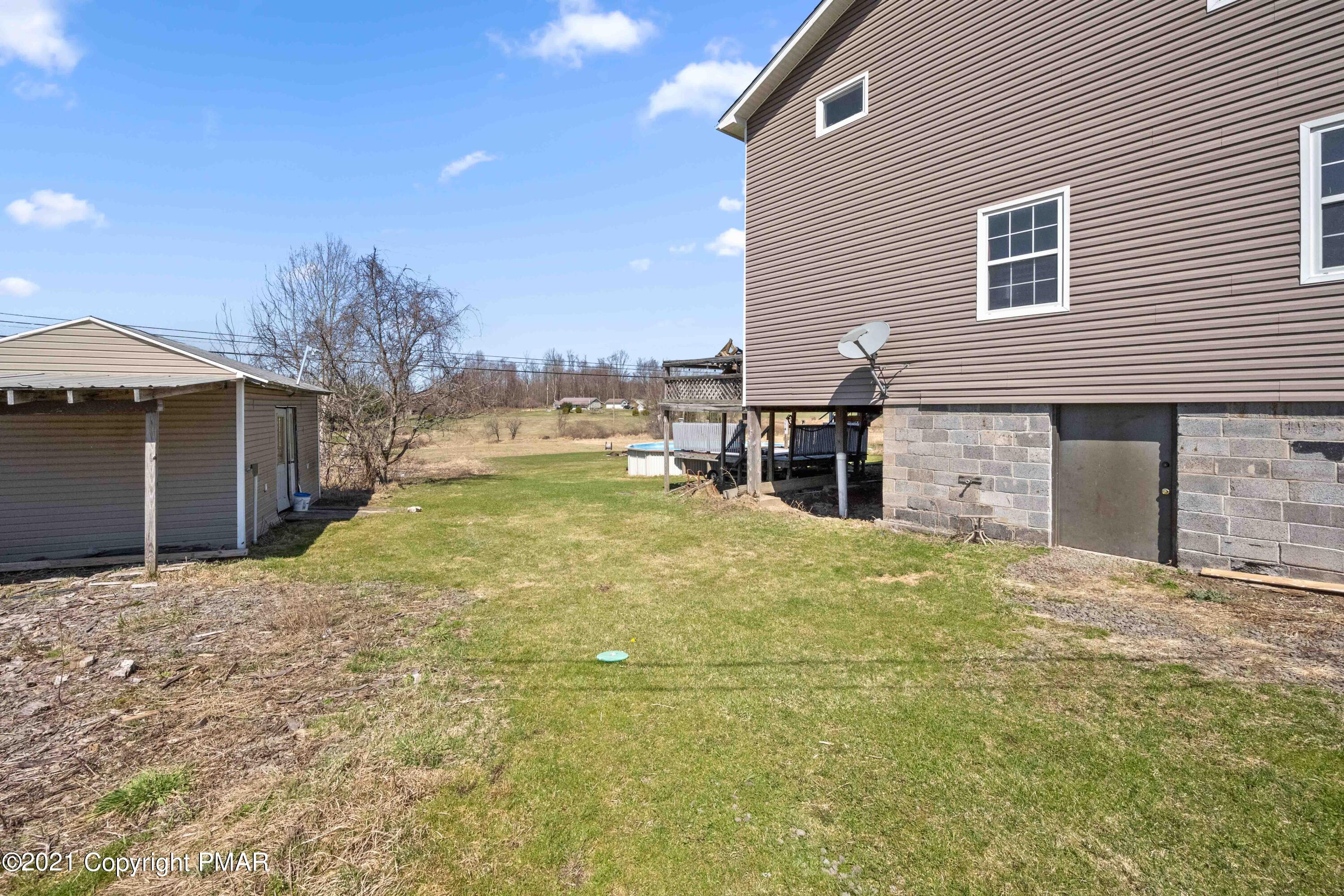 1571 State Rte 2016 Nicholson, PA 18446 - Photo 26 of 28 a bathroom with a sink and a yard