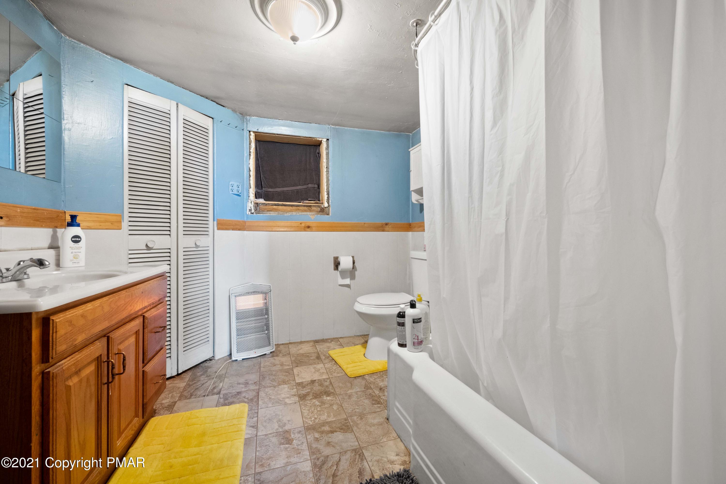 1571 State Rte 2016 Nicholson, PA 18446 - Photo 6 of 28 a bathroom with a sink toilet and shower