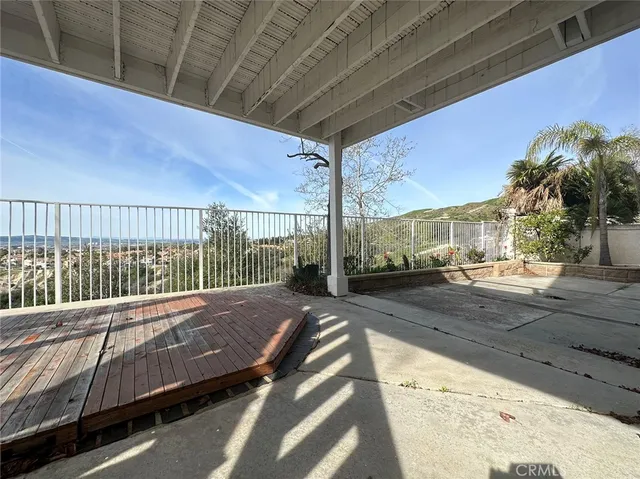 a view of a balcony with a street