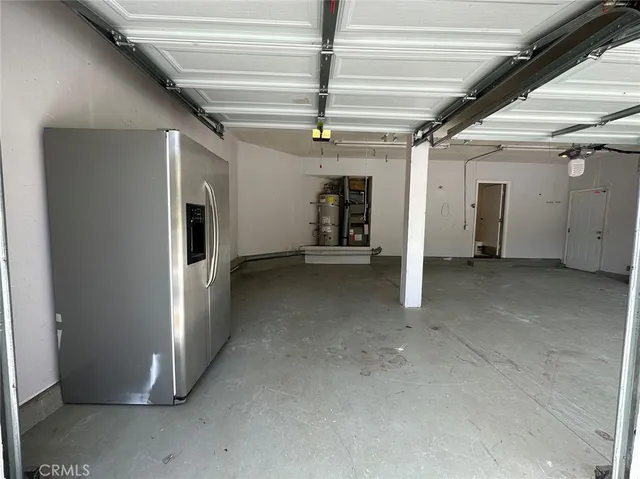 a view of a hallway with seating area