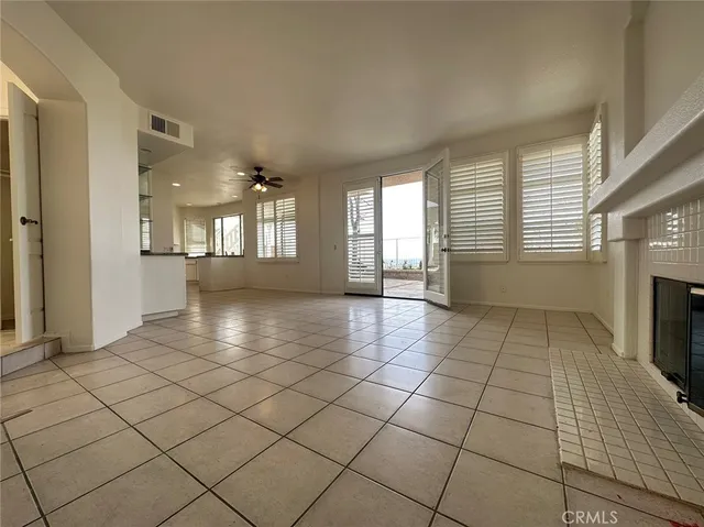 a view of an empty room and window