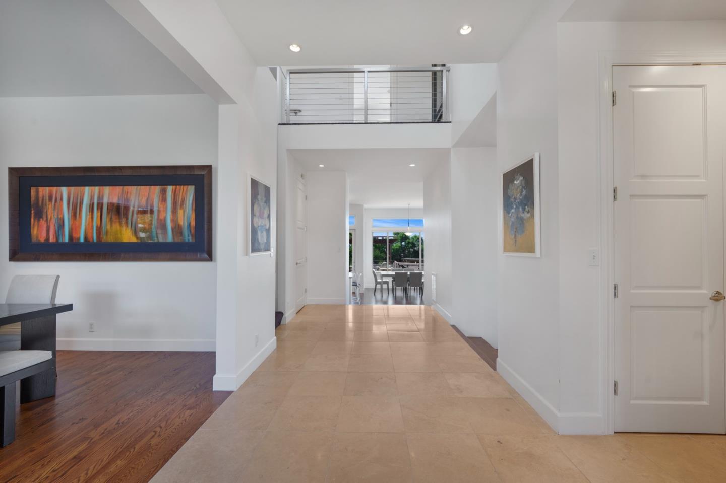 3574 Sweigert Road San Jose, CA 95132 - Photo 4 of 12 a view of a livingroom with furniture and a ceiling fan
