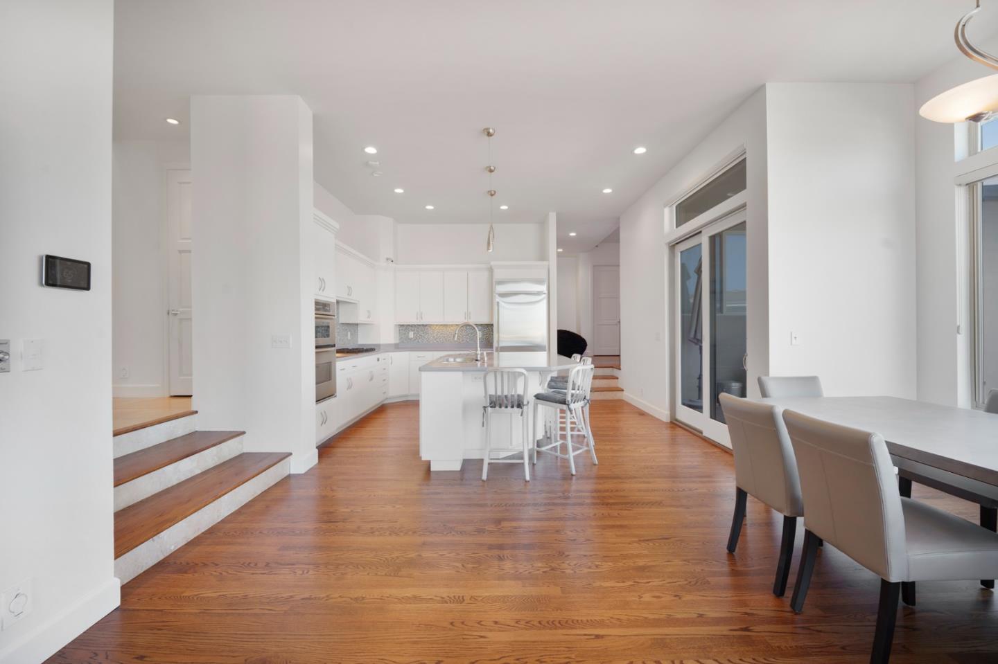 3574 Sweigert Road San Jose, CA 95132 - Photo 6 of 12 a view of a dining room with furniture and wooden floor