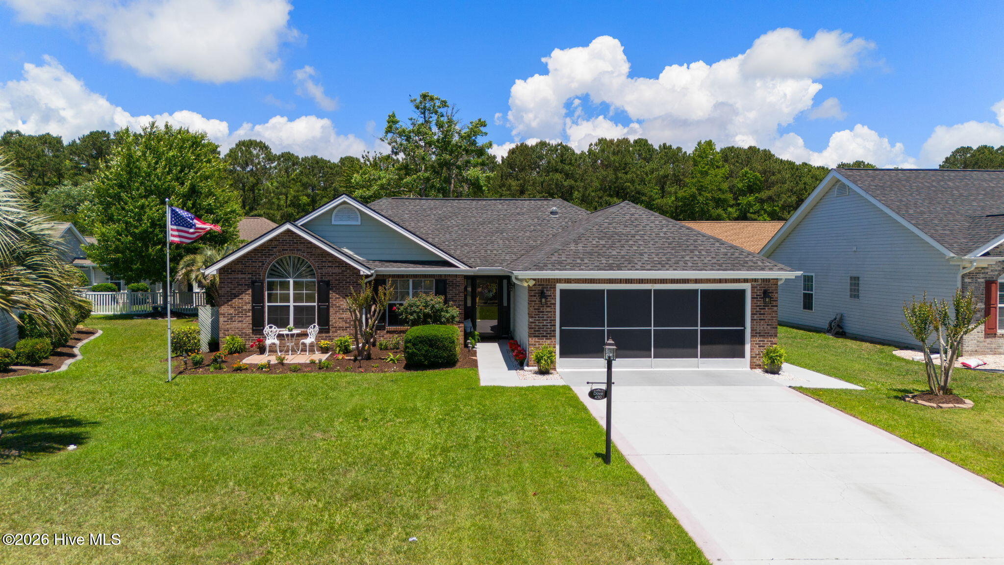 430 Hampton Street Calabash, NC 28467 - Photo 1 of 48 1-web-or-mls-DJI_20260521125211_0007_D_M