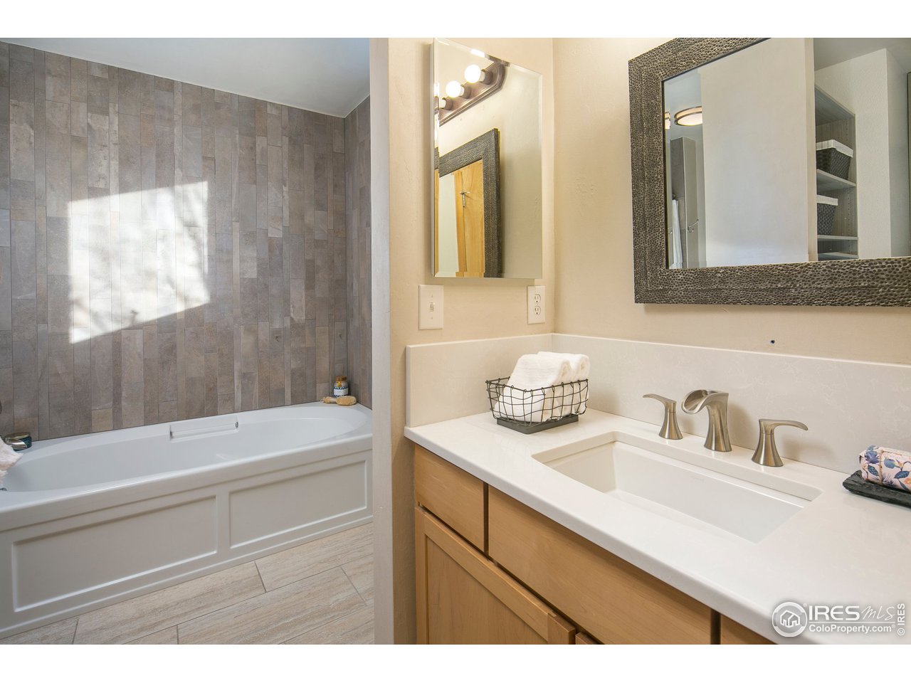 4742 16th Street Boulder, CO 80304 - Photo 13 of 38 a bathroom with a sink and a bathtub