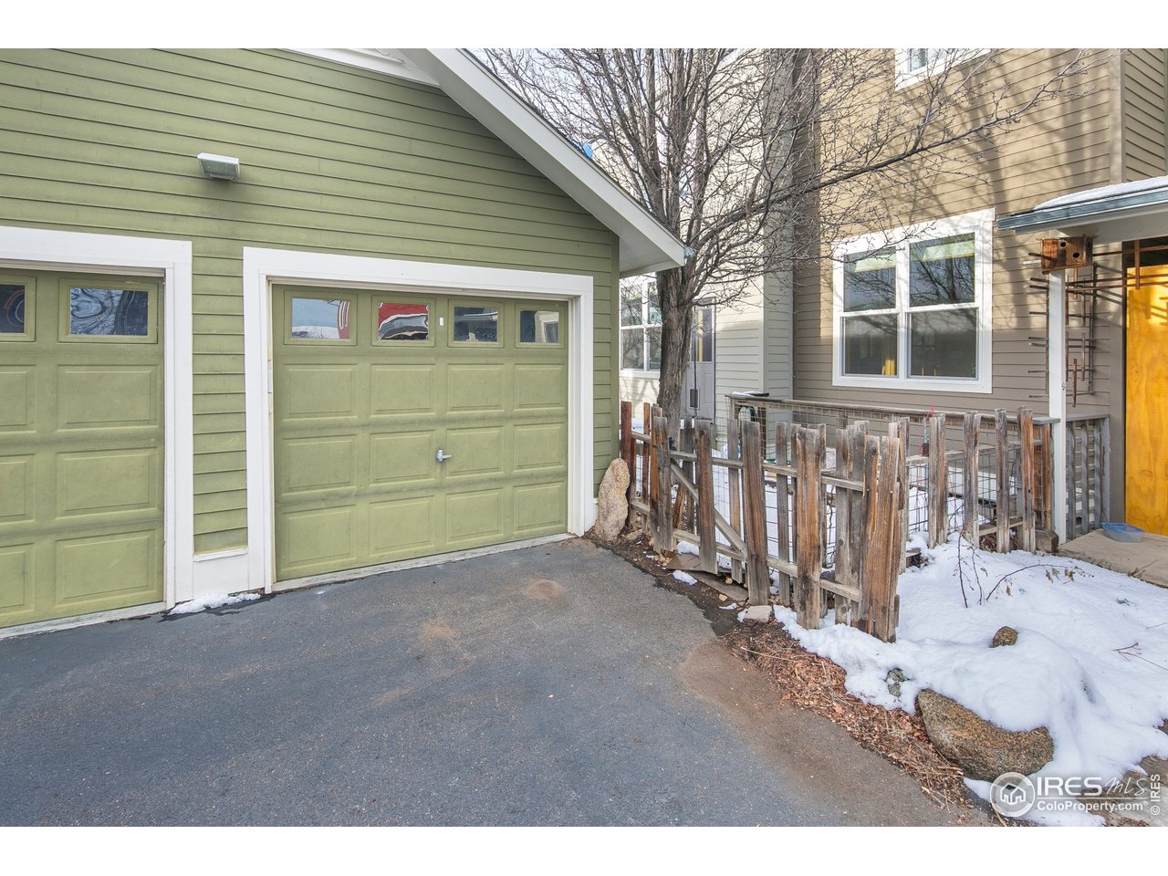 4742 16th Street Boulder, CO 80304 - Photo 24 of 38 a view of a house with a yard