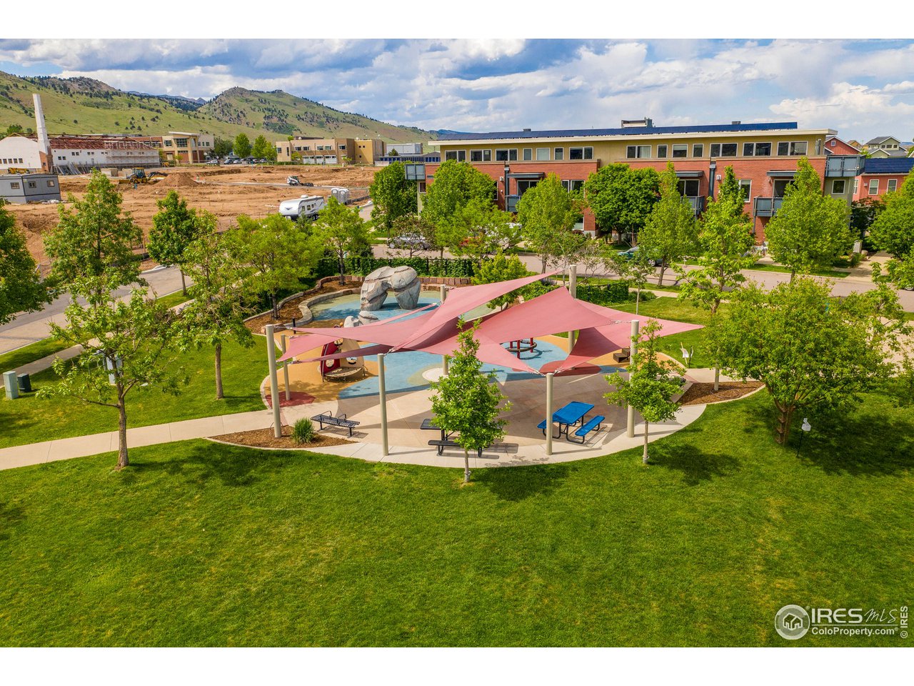 4742 16th Street Boulder, CO 80304 - Photo 32 of 38 a view of a swimming pool with a yard