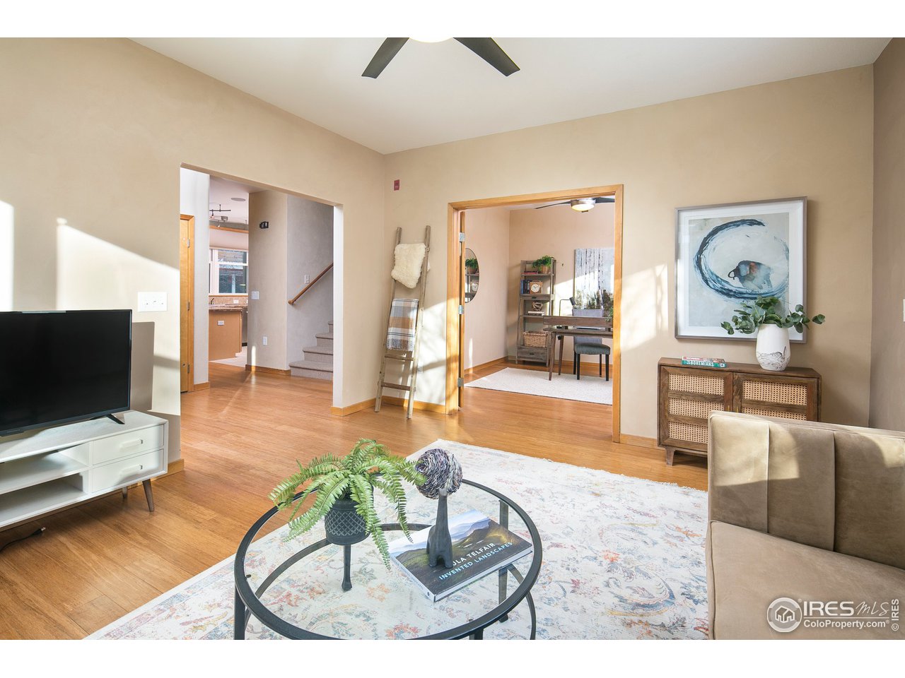4742 16th Street Boulder, CO 80304 - Photo 5 of 38 a living room with furniture and a flat screen tv