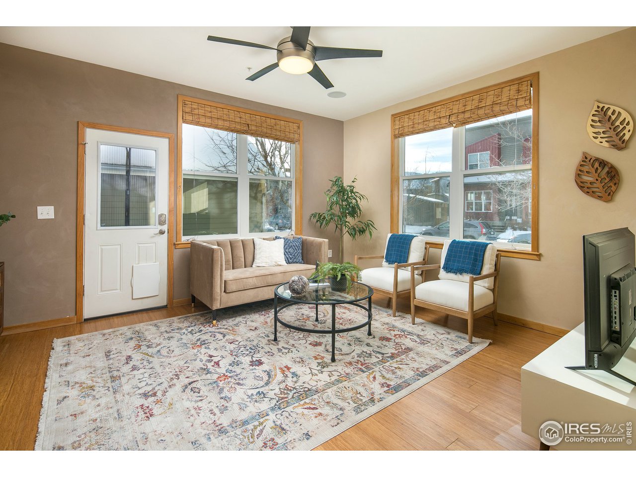 4742 16th Street Boulder, CO 80304 - Photo 7 of 38 a living room with furniture and a flat screen tv