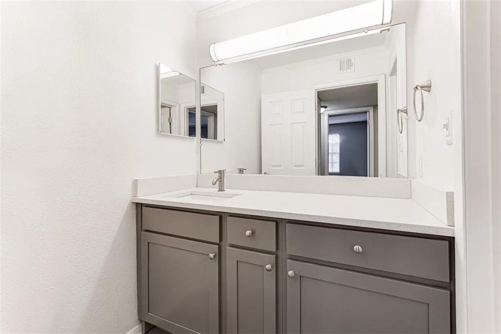 2330 Cobb Parkway Southeast, Unit 1111 Smyrna, GA 30080 - Photo 6 of 19 a bathroom with a sink and a mirror