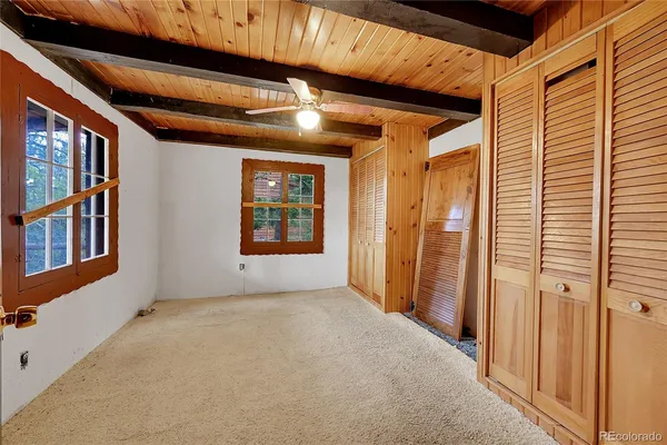 a view of a backyard of the house