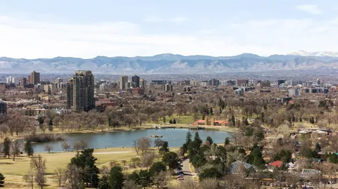 a view of a building and a people on a street