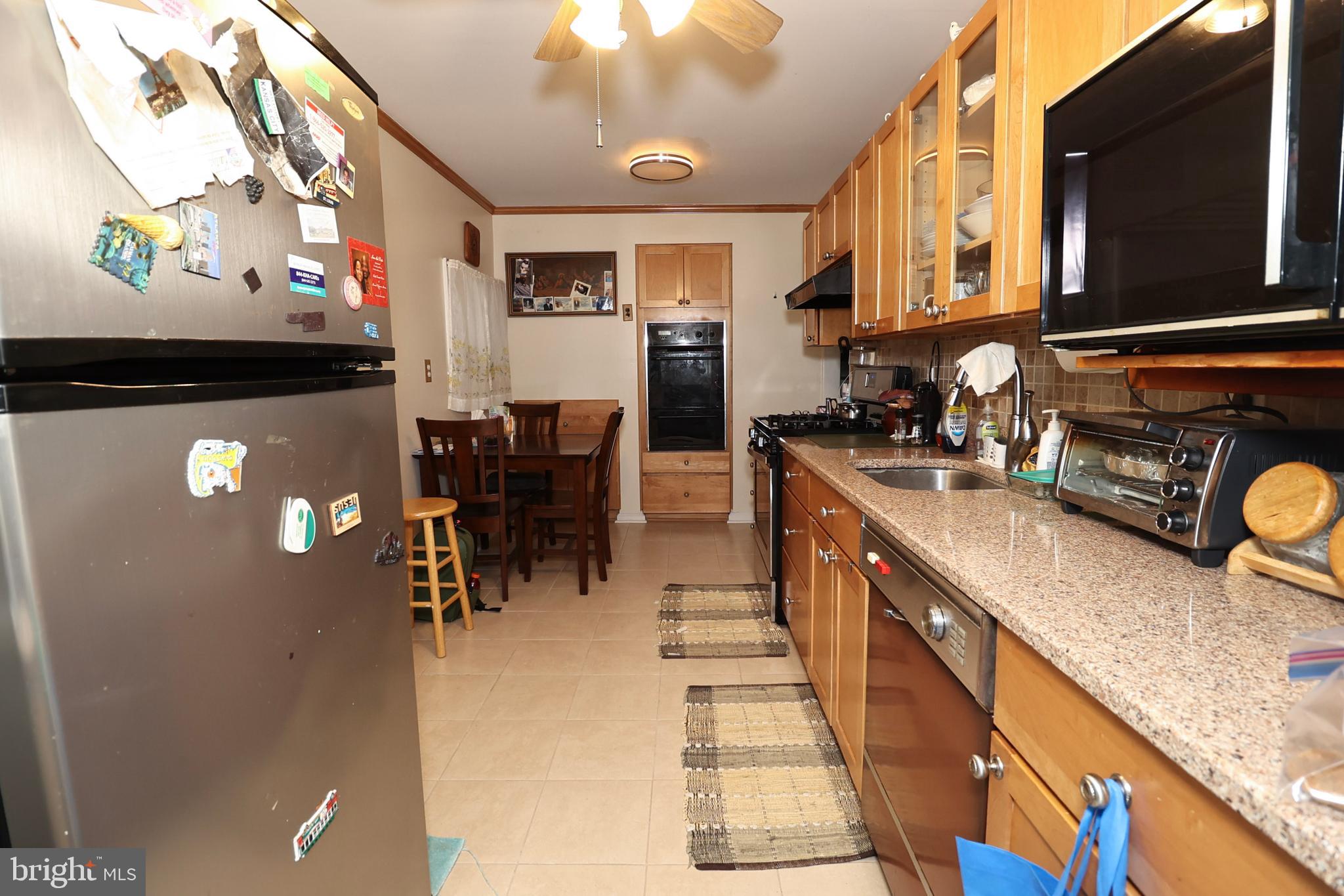 237 Capital Drive Mantua, NJ 08051 - Photo 29 of 91 a kitchen with a sink appliances and cabinets