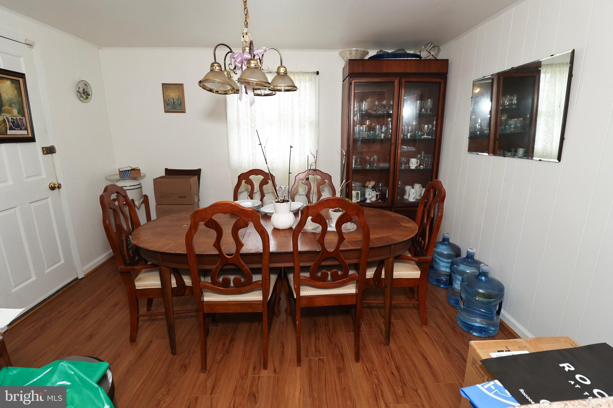 237 Capital Drive Mantua, NJ 08051 - Photo 37 of 91 a view of a dining room with furniture and wooden floor