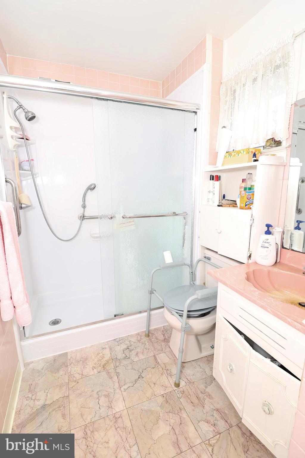 237 Capital Drive Mantua, NJ 08051 - Photo 68 of 91 a bathroom with a granite countertop sink a toilet and a shower