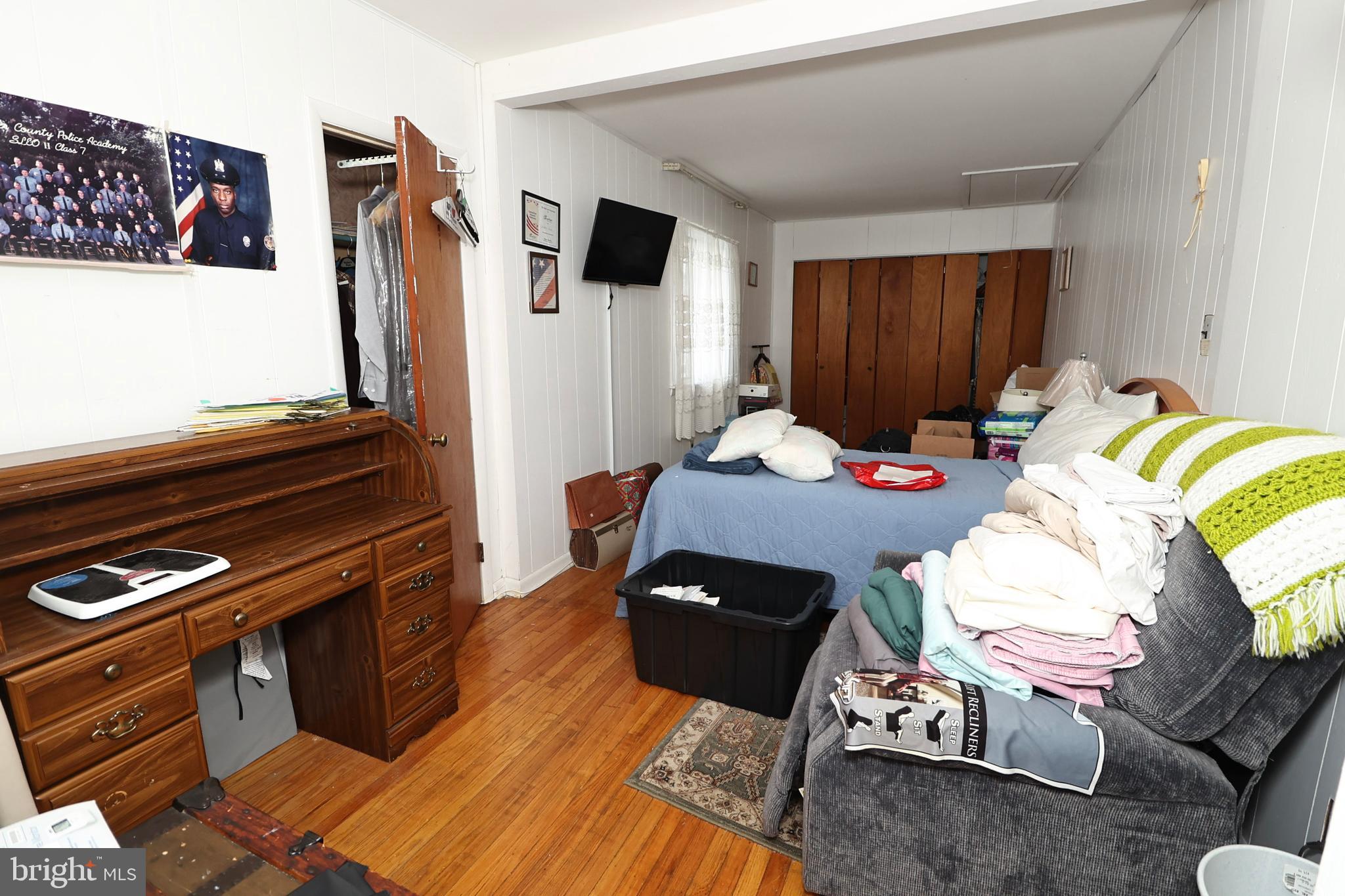 237 Capital Drive Mantua, NJ 08051 - Photo 73 of 91 a living room with furniture and a flat screen tv