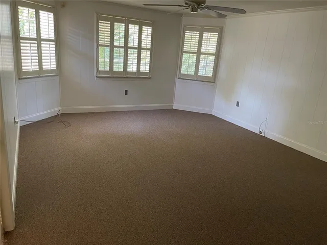 an empty room with windows