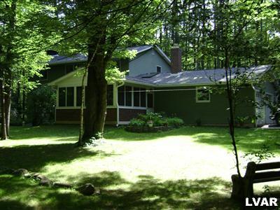 0 Smith Road Kunkletown, PA 18058 - Photo 1 of 23 a front view of a house with garden