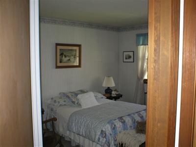 0 Smith Road Kunkletown, PA 18058 - Photo 11 of 23 a bedroom with a bed and a painting on the wall
