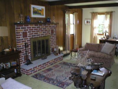 0 Smith Road Kunkletown, PA 18058 - Photo 2 of 23 a living room with furniture a large window and a fireplace