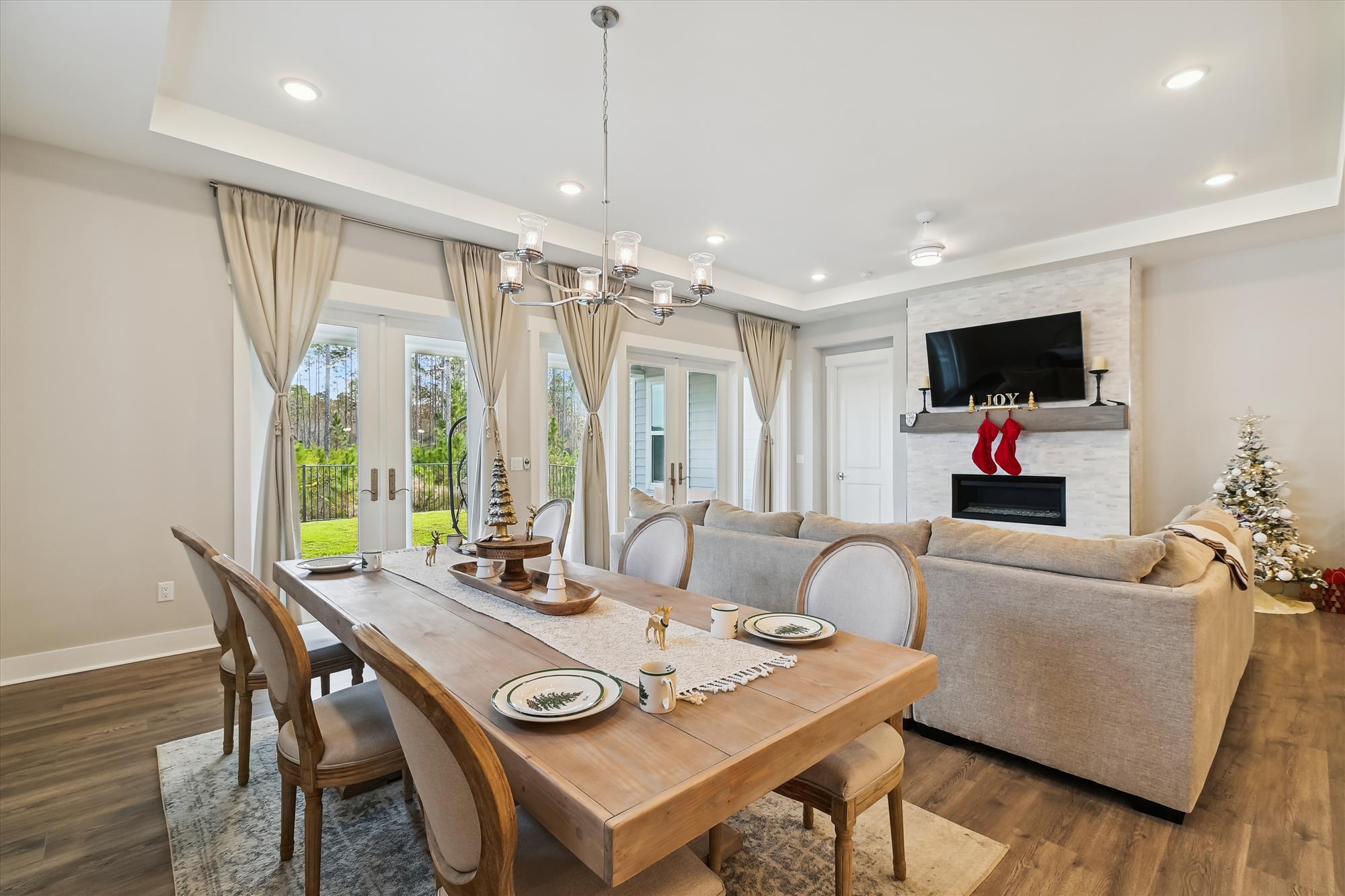236 Naturewalk Blvd Inlet Beach Inlet Beach, FL 32461 - Photo 12 of 38 a view of a dining room with furniture window and wooden floor