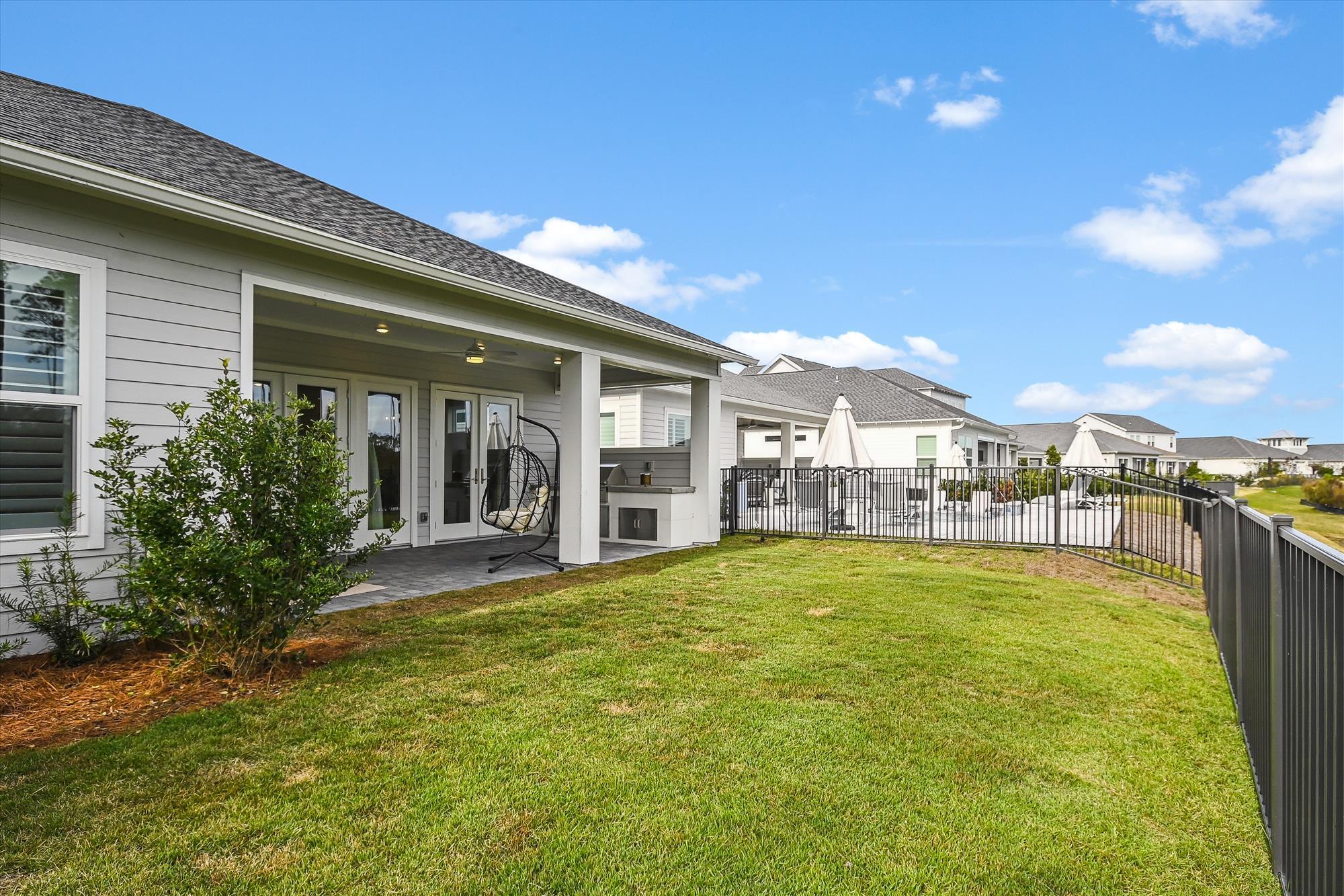 236 Naturewalk Blvd Inlet Beach Inlet Beach, FL 32461 - Photo 18 of 38 a view of a house with swimming pool and porch