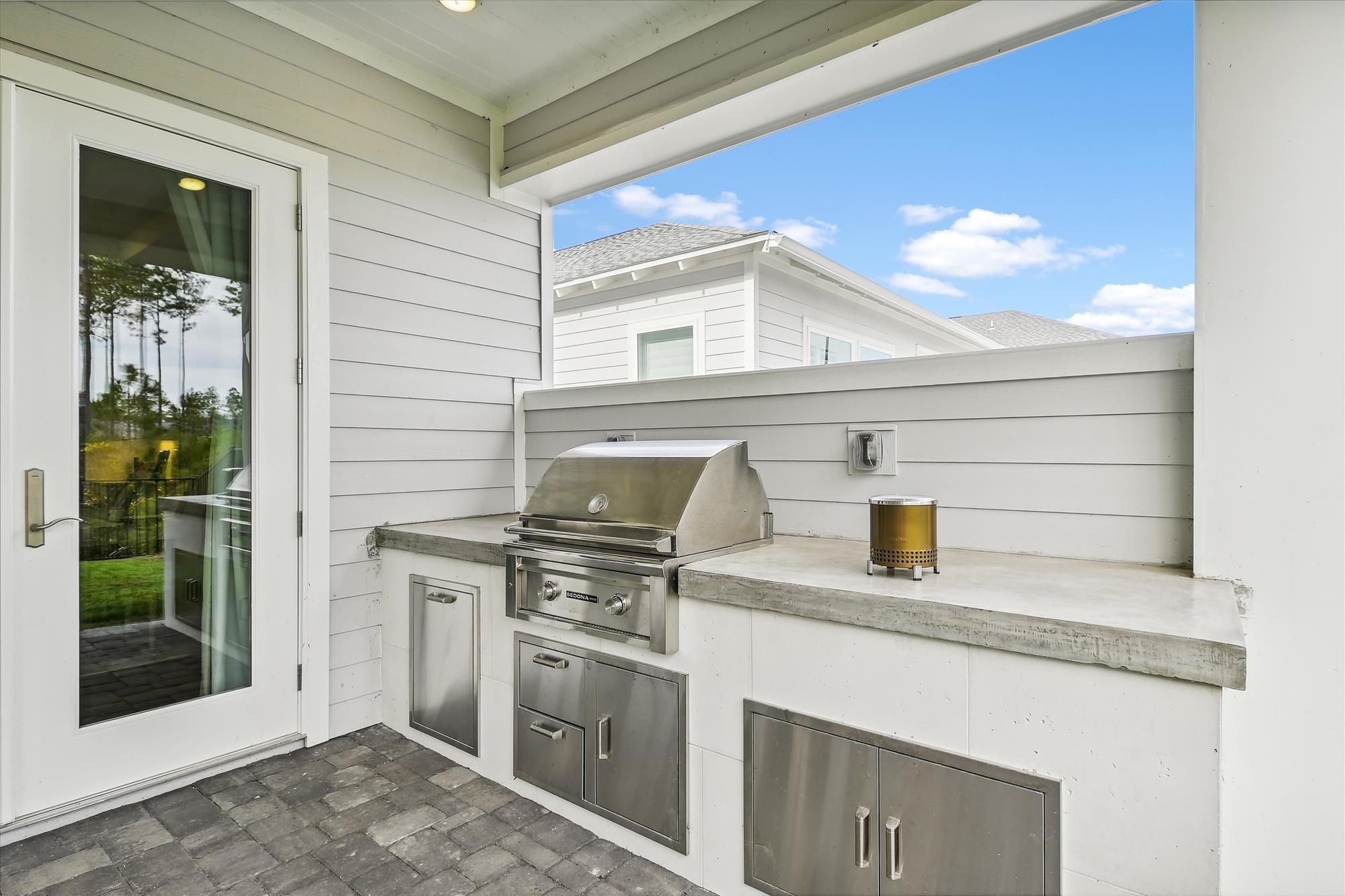 236 Naturewalk Blvd Inlet Beach Inlet Beach, FL 32461 - Photo 20 of 38 a kitchen with a stove and a sink
