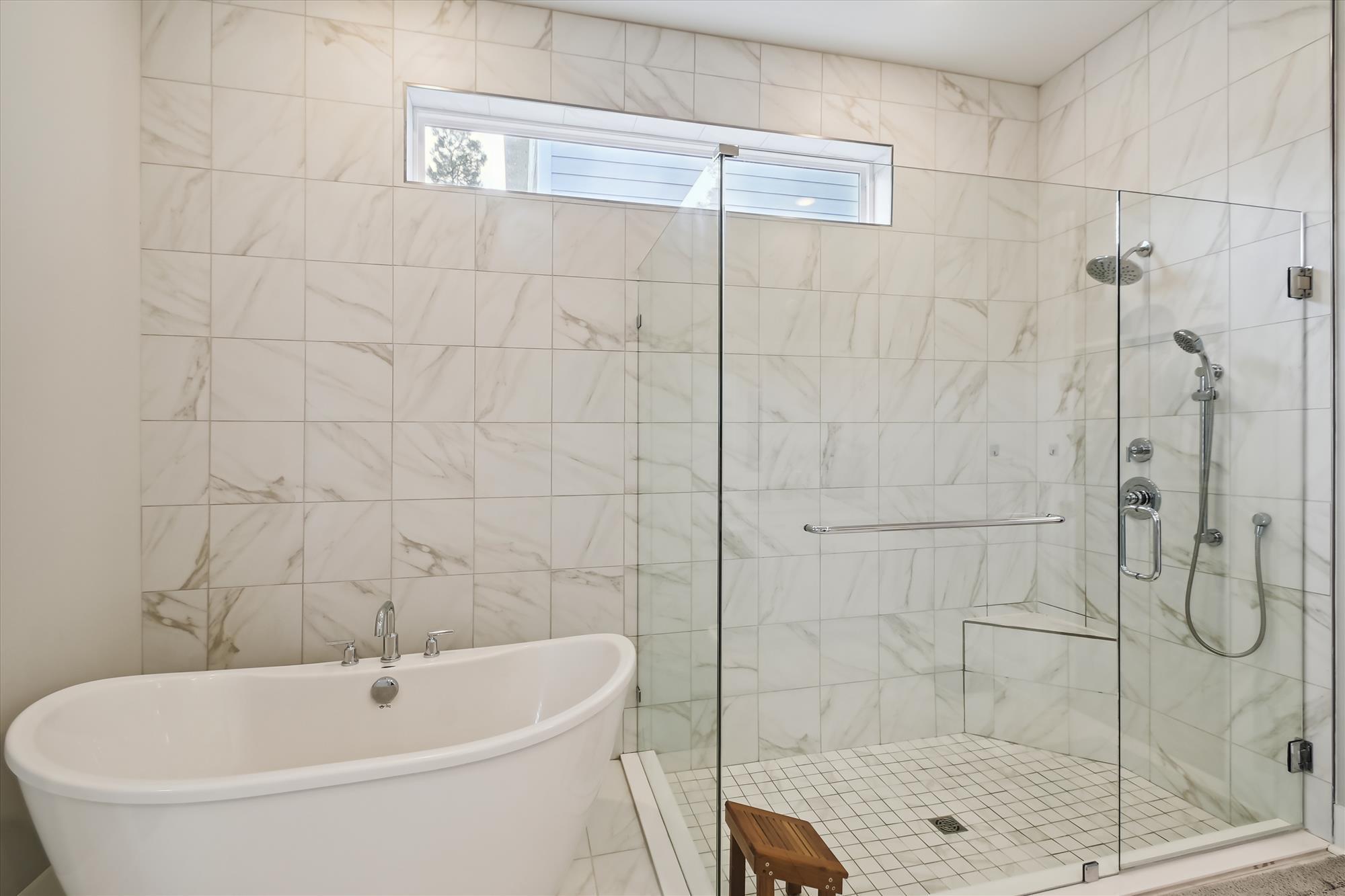 236 Naturewalk Blvd Inlet Beach Inlet Beach, FL 32461 - Photo 21 of 38 a white bath tub sitting next to a shower