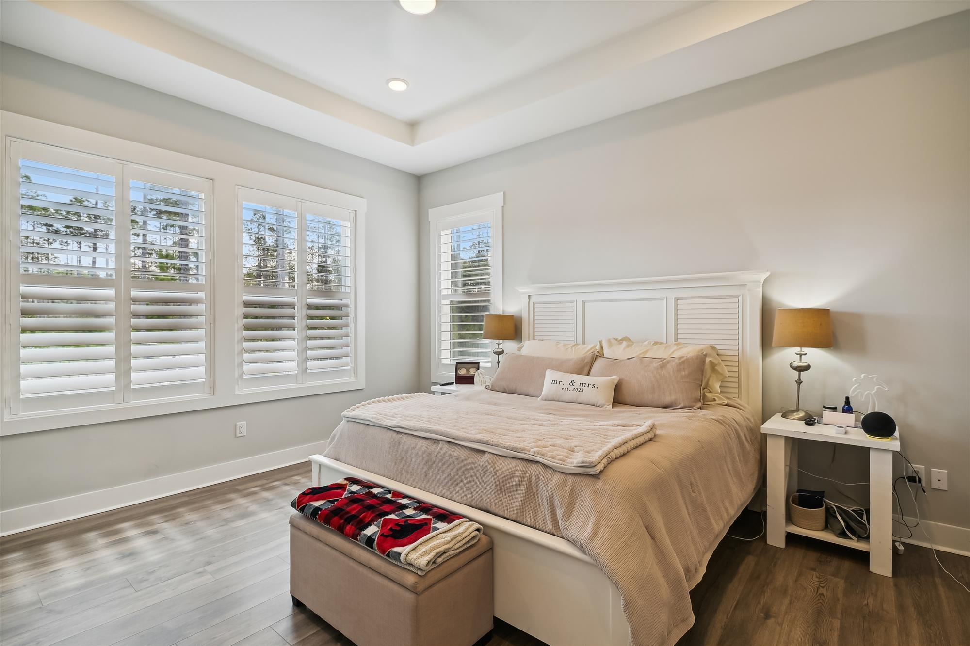 236 Naturewalk Blvd Inlet Beach Inlet Beach, FL 32461 - Photo 24 of 38 a bedroom with a bed and wooden floor