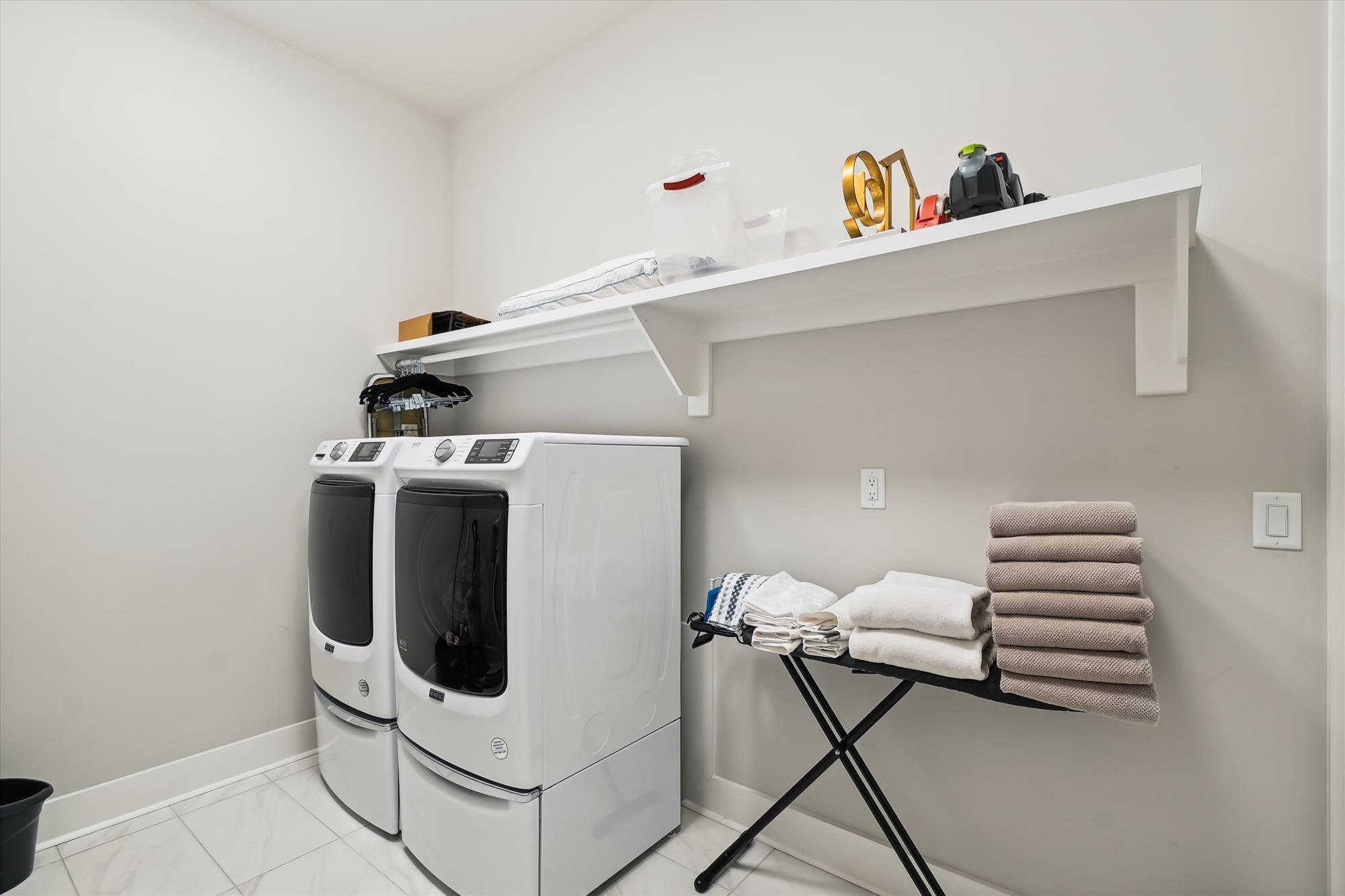 236 Naturewalk Blvd Inlet Beach Inlet Beach, FL 32461 - Photo 27 of 38 a utility room with dryer and washer