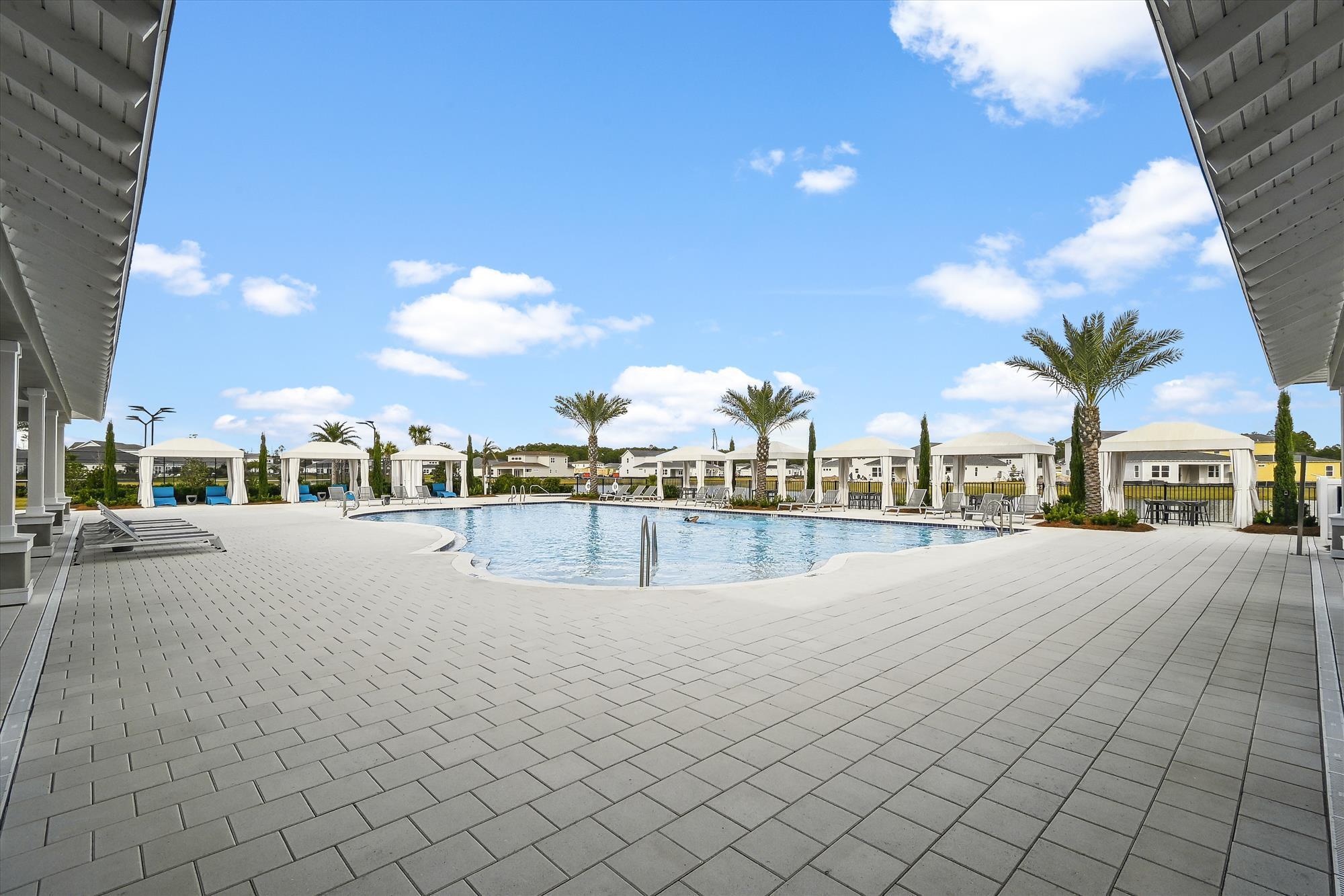 236 Naturewalk Blvd Inlet Beach Inlet Beach, FL 32461 - Photo 30 of 38 a view of a swimming pool and a terrace