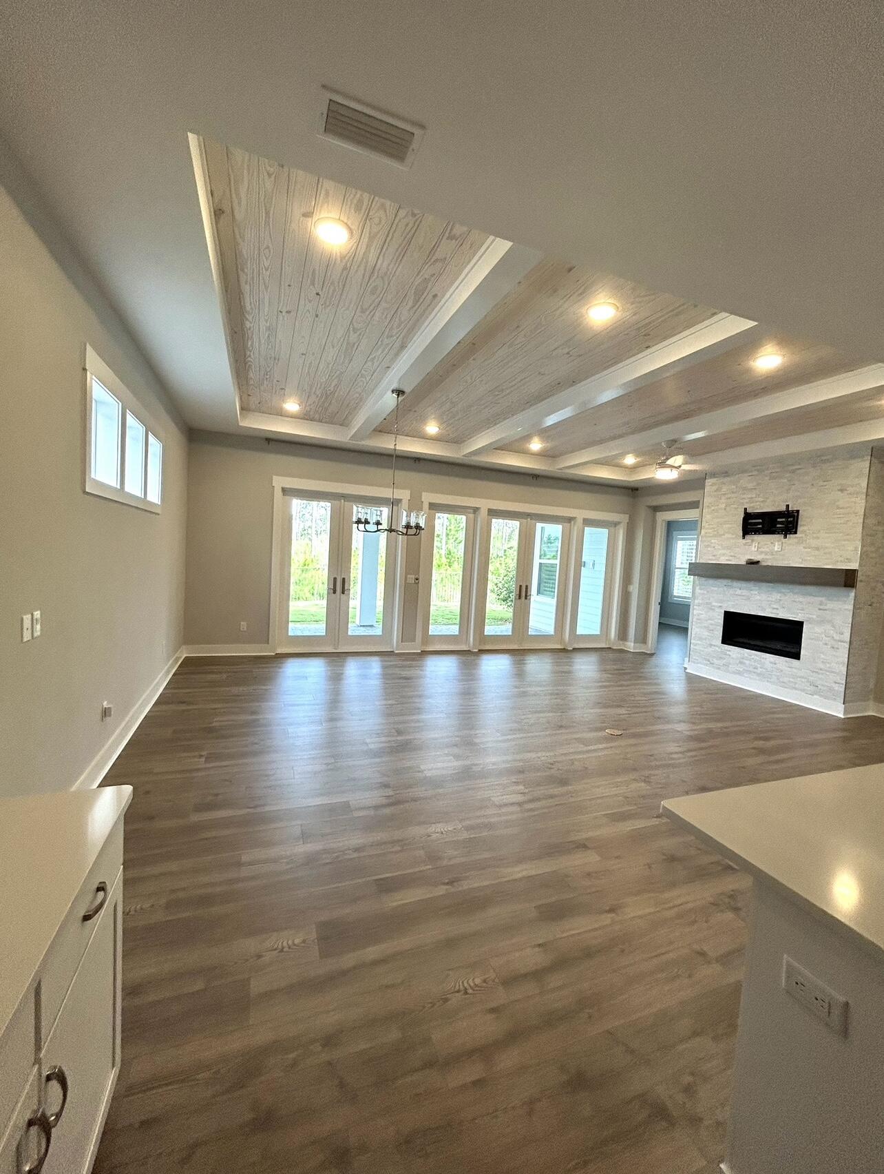 236 Naturewalk Blvd Inlet Beach Inlet Beach, FL 32461 - Photo 3 of 38 a view of an empty room with wooden floor