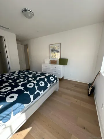 a bathroom with double vanity sinks a vanity and a mirror