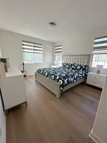 a bathroom with a sink a mirror and a shower