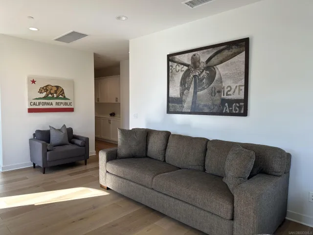 a living room with furniture and a couch