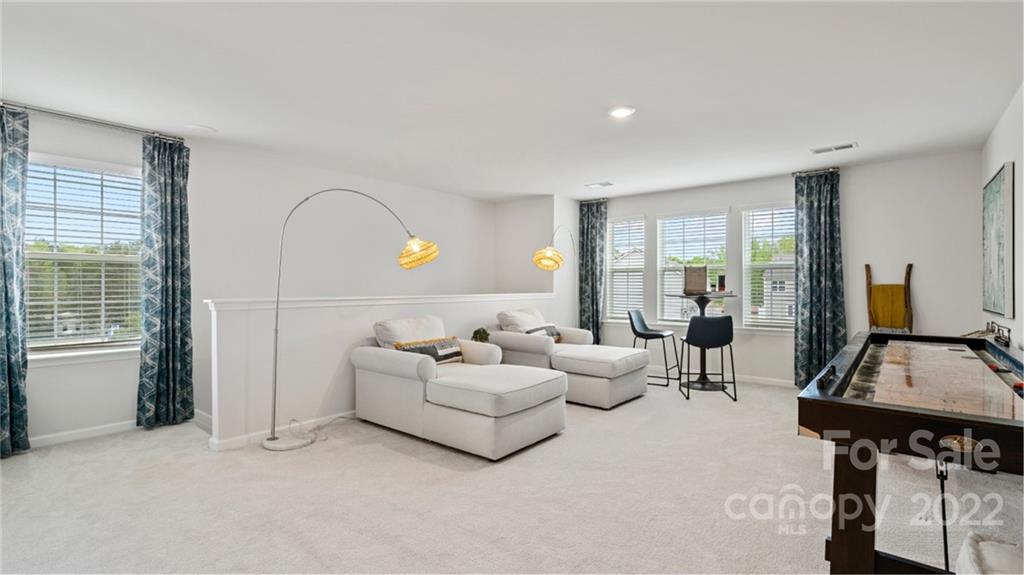 6520 Gopher Road, Unit 322 Lancaster, SC 29720 - Photo 11 of 25 a living room with furniture and wooden floor