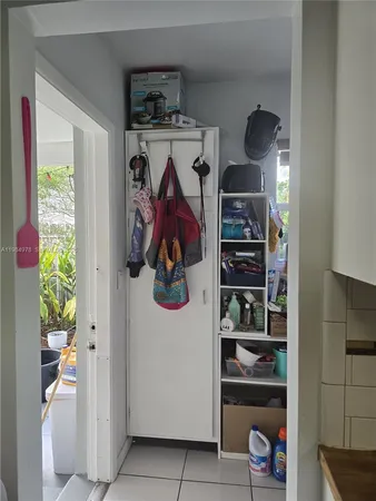 a room with storage and utility room
