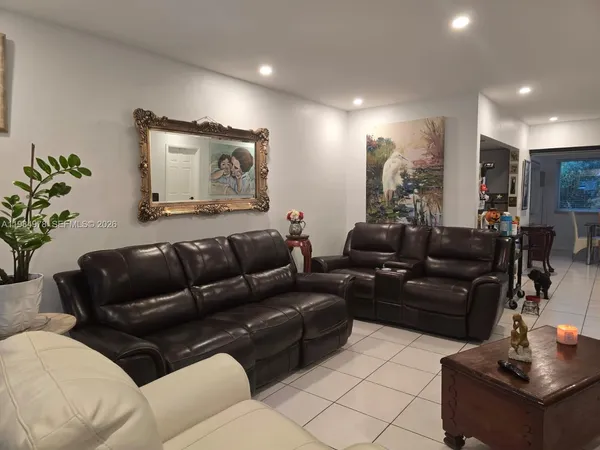a living room with furniture and a couch
