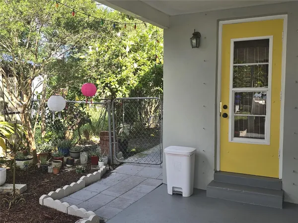 a front view of a house with a porch